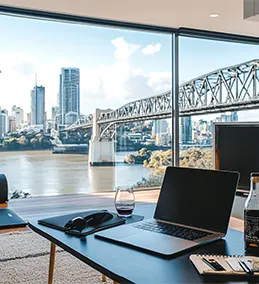 Modern office overlooking a bridge and river, showcasing an outsourced accounting firm in North Carolina.