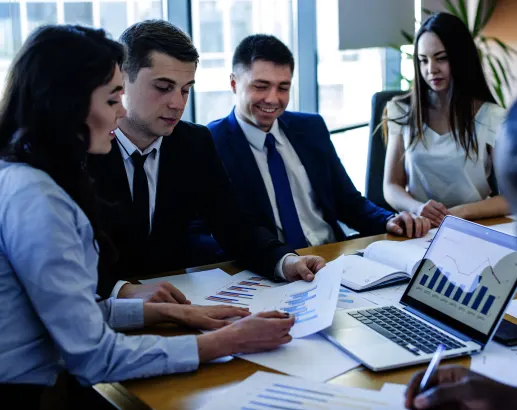 A team of specialists in a collaborative office setting, showcasing one of the top Accounting Outsourcing Companies in Virginia.