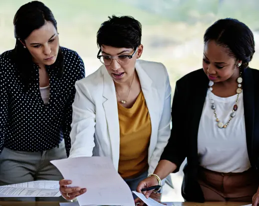 A collaborative team meeting in a professional Virginia office setting, showcasing one of the leading Accounting Outsourcing Companies in Virginia.