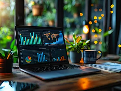 A laptop displaying financial performance data is used for online financial controller services for small businesses.