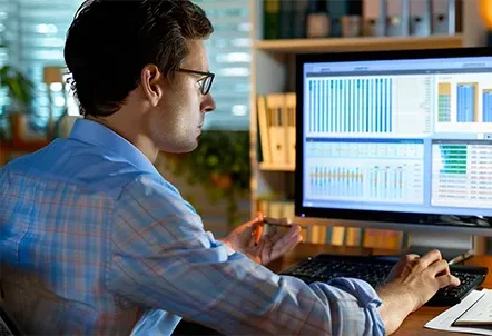 A specialist analyzing detailed ledger reports to provide accurate accounts receivable services for small businesses.