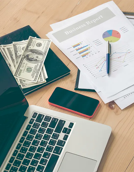 Payroll planning workspace with financial graphs and tools supporting best payroll services for startups.