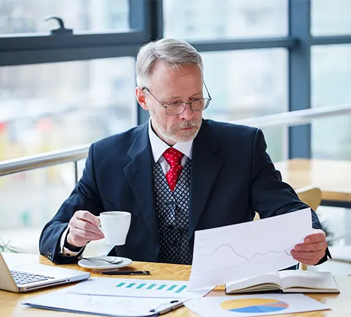 Professional accountant in New York preparing year-end financial statements