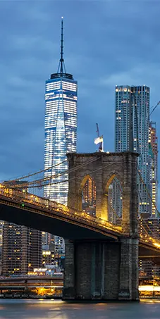 Brooklyn Bridge and downtown New York skyline illustrating outsourced payroll services in New York