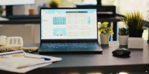 2026 payroll calendar and payroll data displayed on a laptop